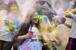 Students celebrate the Hindu festival of colors. (Ryan Glista/UConn Photo)