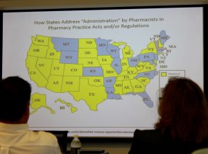 Rules and regulations for administration of drugs by pharmacists varies from state to state. (Sheila Foran/UConn Photo)
