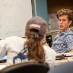 Students engage in discussion at the Homer Babbidge Library in May 2017. Where library users were once cautioned to study silently or speak in hushed tones, today's library is designed to encourage debate and discussion. (Sean Flynn/UConn Photo)