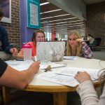 A group of students studying together in the Homer Babbidge Library in May 2017. The renovations will create more space for working in groups. (Sean Flynn/UConn Photo)