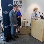 State Senator Cathy Osten, right, speaks about the state budget at the Avery Point campus student center on Sept. 25, 2017. Frome left are State Rep. Chris Soto, Gov. Dannel Malloy and President Susan Herbst. (Peter Morenus/UConn Photo)
