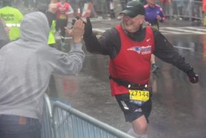 Bill Donovan crossing the finish line of the Boston Marathon in 2015 (Photo Courtesy of Bill Donovan). 