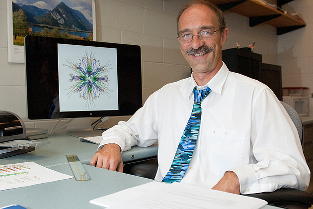 Biologist Peter Burkhard with the molecule he developed to deliver nicotine to the immune system.