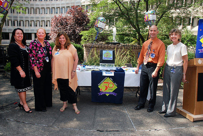 From left: Candy Pettigrew, Pam Miles, Sandy Kressner, Steve Jacobs and Patti Wawzyniecki at the time capsule ceremony on September 12, 2011. (Janine Gelineau/UConn Health Center Photo)