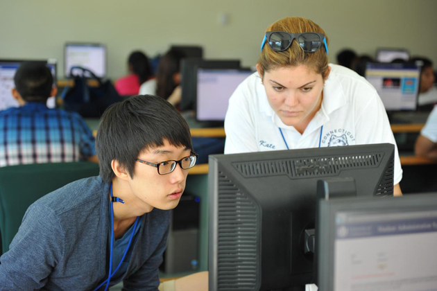International students receive training on University computer systems at the Information Technologies Engineering Building.