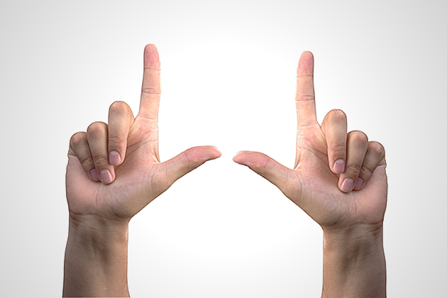 Left and right hand showing a forward letter "L" on left hand.