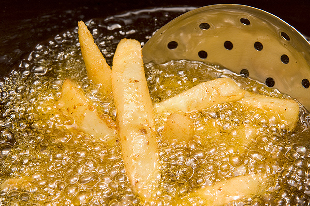French fries in hot oil.