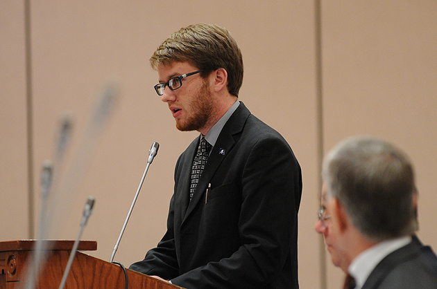 Samuel Tracy, president of the Undergraduate Student Government, speaks on the proposed tuition increase during the Board of Trustees meeting at Rome Ballroom on Dec. 19, 2011. (Peter Morenus/UConn Photo)
