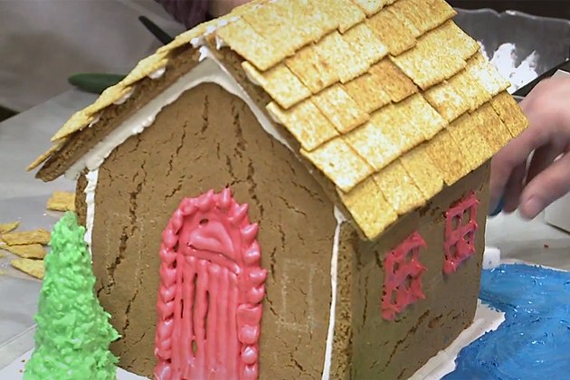 Gingerbread house being built.