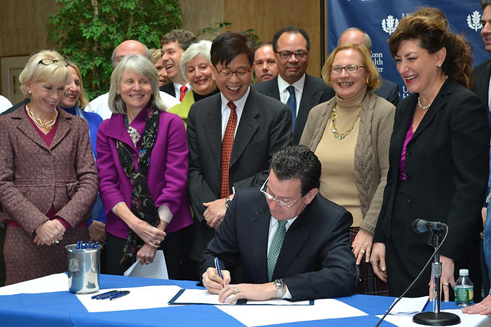 Gov. Dannel P. Malloy during a ceremonial bill signing at the Health Center after a final agreement was reached between the state and Jackson Laboratory. (Tina Encarnacion/UConn Health Center Photo)