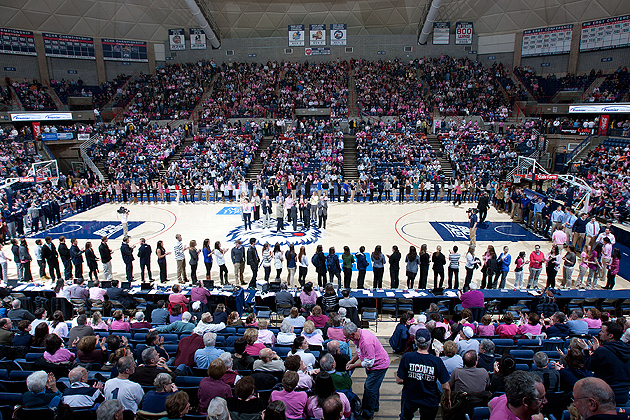 More than 300 Student-athletes who have attained at least a 3.0 grade-point average within the past academic year surround the basketball court in Gampel Pavilion after being recognized by President Susan Herbst and Provost Peter J. Nicholls for their success in the classroom during halftime of the women's basketball team game against Georgetown on Feb. 11.(Steve Slade '89 (SFA) for UConn)