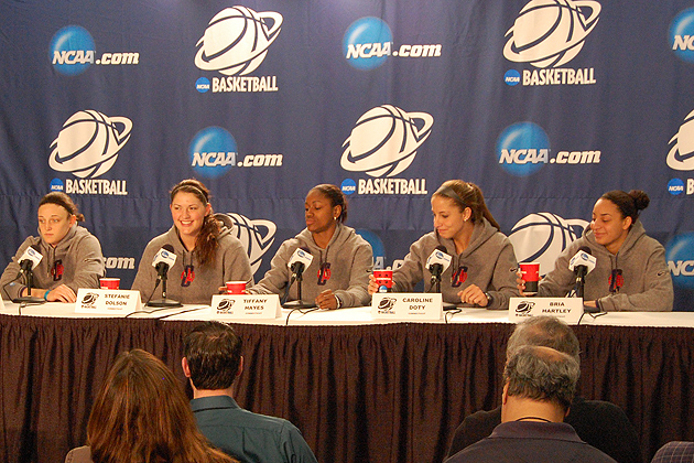 The Huskies starting five players await questions about their upcoming NCAA Tournament game on Tuesday against Kentucky in Kingston, R.I. From left, Kelly Faris '13 (ED), Stefanie Dolson '14 (CLAS), Tiffany Hayes '12 (CLAS), Caroline Doty '13 (CLAS), and Bria Hartley '15 (CLAS). (Ken Best/UConn Photo)
