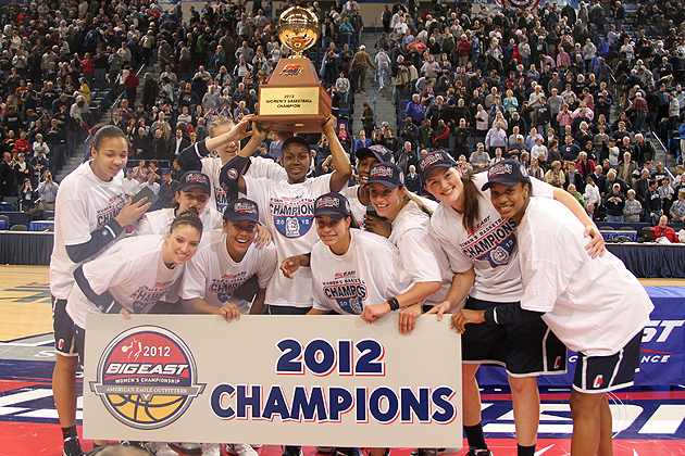 The Huskies celebrate winning the 2012 Big East Women's Basketball Tournament Championship Tuesday night at the XL Center in Hartford (Bob Stowell '70 (CLAS)/Big East)