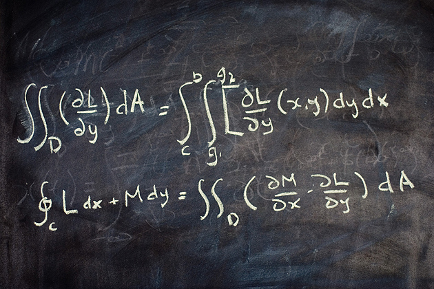 Calculus equation on a black board.