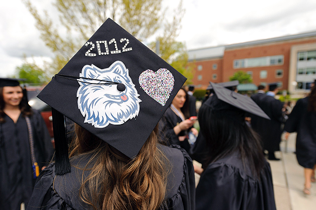 Melanie Cunha '12 (CLAS) wears a decorated cap before the early afternoon College of Liberal Arts and Sciences commencement ceremony held at Harry A. Gampel Pavilion on May 6, 2012. (Peter Morenus/UConn Photo)