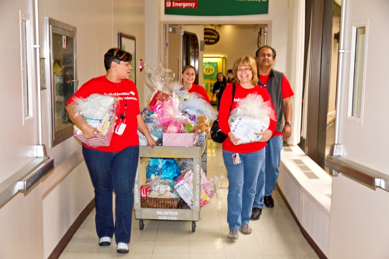 A cart loaded with gift baskets is on its way to the NICU.