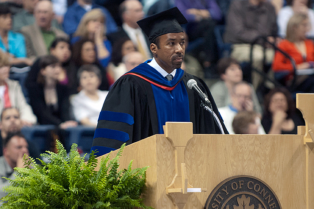 Associate Dean Jeffrey Ogbar speaks at the podium during the early afternoon College of Liberal Arts and Sciences commencement ceremony held at Harry A. Gampel Pavilion on May 6, 2012. (Max Sinton '15 (CANR)/UConn Photo)