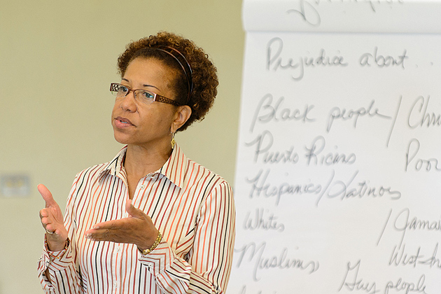 Salome Raheim, dean of social work, speaks to students during a Kingian nonviolence youth academy held at Weaver High School in Hartford on July 23, 2012. (Peter Morenus/UConn Photo)