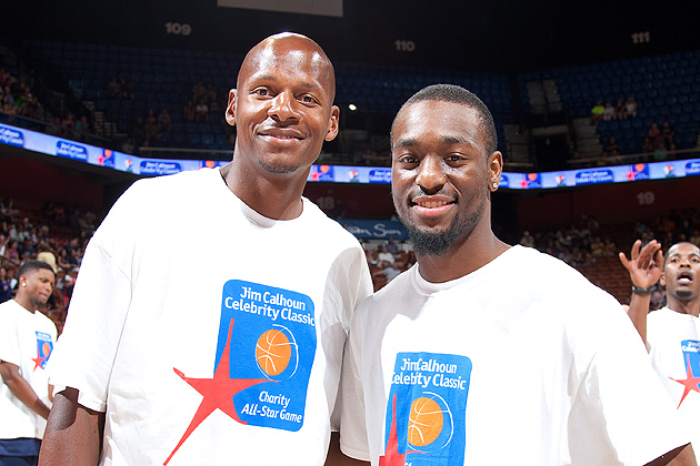 Ray Allen (1993-1996), left, and Kemba Walker ’11 (CLAS) received some of the loudest ovations from the crowd at Mohegan Sun Arena before the All-Star Game. (Steven Slade '89 (SFA) for UConn)