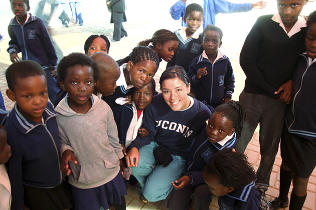 Justina Leung '09 (CANR) with schoolchildren in South Africa, during a Study Abroad program.