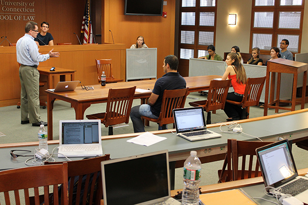 Adjunct professor Ronald Murphy '83 JD teaches a Trial Advocacy simulation in the Koskoff Koskoff and Bieder Trial Courtroom at the Law School campus in Hartford. (Bianca Slota/UConn Photo)