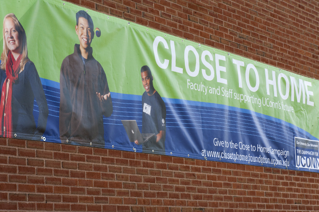 Pictures of the Close to Home banner hanging on the Student Union on Oct. 17, 2012. (Sean Flynn/UConn Photo)