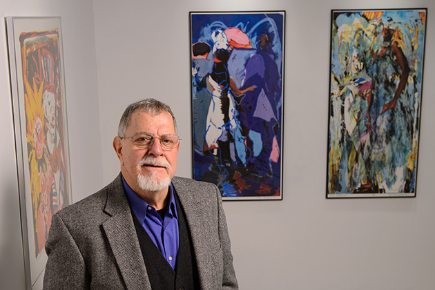 Gus Mazzocca, professor emeritus of art and art history, with a retrospective exhibit of his art at the Contemporary Art Gallery at the Fine Arts Building on Jan. 24, 2013. (Peter Morenus/UConn Photo)