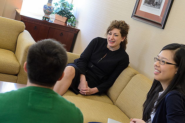 President Susan Herbst talks with students during her office hours in Gulley Hall. (Ariel Dowski/UConn File Photo)