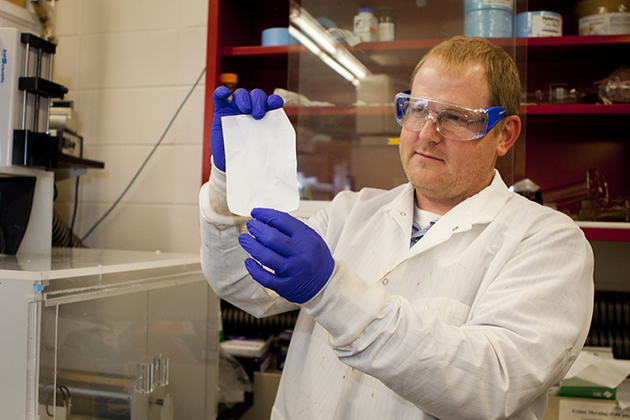 Jeffrey McCutcheon, assistant professor of chemical and biomolecular engineering. McCutcheon’s lab specializes in making nanofiber nonwovens (pictured here) through a process called electrospinning. These materials have applications in water treatment, energy production, sensors and tissue engineering. (Chris LaRosa/UConn Photo)