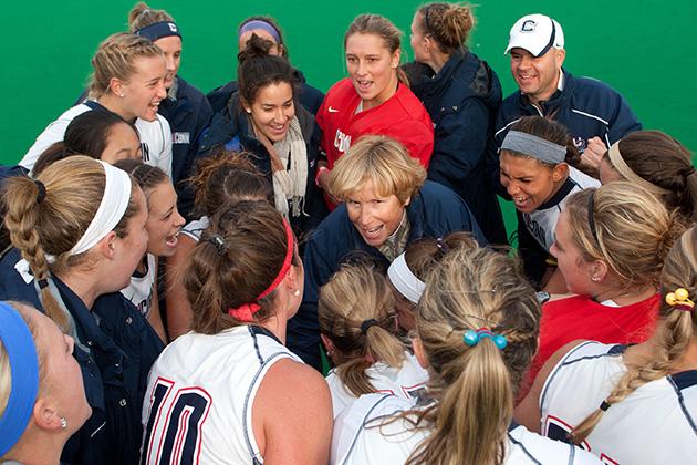 UConn's head field hockey coach Nancy Stevens is the all-time winningest coach in NCAA Division I history, with a career record of 562 wins. She is shown here with the 2012 team. (Steve Slade '89 (SFA) for UConn)