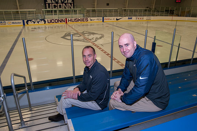From left; Men's Ice Hockey head coach Mike Cavanaugh with Women's head coach Chris MacKenzie on Oct. 10, 2013. (Sean Flynn/UConn Photo)