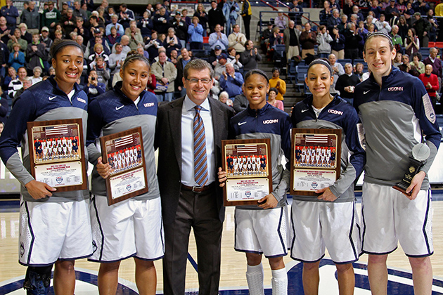 Five Huskies were recognized for their USA Basketball accomplishments before the women’s basketball team’s 90-40 win over Houston at Gampel Pavilion on Tuesday. Above, from left: Morgan Tuck ’16 (CLAS, Kaleena Mosqueda-Lewis ’15 (CLAS), head coach Geno Auriemma, Moriah Jefferson ’16 (CLAS), Bria Hartley ’14 (CLAS) and Breanna Stewart ’16 (CLAS). (Bob Stowell ’70 (CLAS) for UConn)