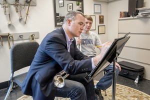 Louis Hanzlik gives one-on-one instruction to Sean Sonntag ’18 at the Department of Music. (Sean Flynn/UConn Photo)