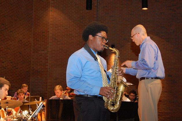 Colin Walters '14 (SFA) plays an alto saxophone solo during Dolphy Dance. (Ken Best/UConn Photo)