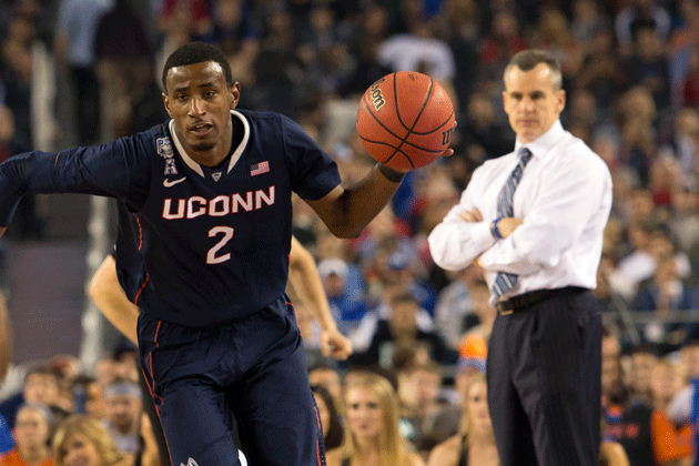 Deandre Daniels drives to the basket, watched by Florida head coach Billy Donovan, during the NCAA semifinal on April 5. (Steve Slade '89 (SFA) for UConn)