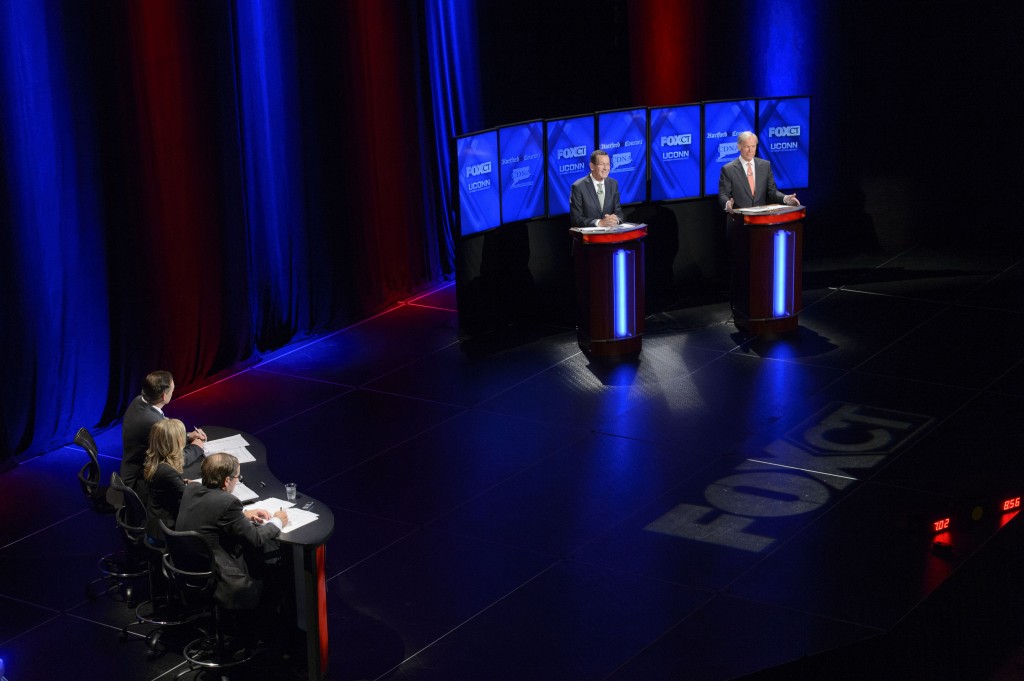 Dan Malloy, left and Tom Foley debate at the Jorgensen Center for the Performing Arts on Oct. 2, 2014. (Peter Morenus/UConn Photo)