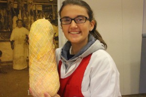 Nicole Perron '16 (CAHNR) proudly displays a Galantina de Pollo - a cold stuffed chicken - that she helped prepare. (Photo courtesy of CAHNR)