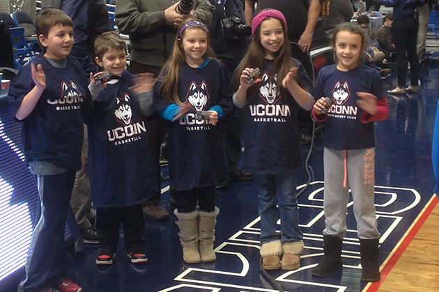 The Junior Husky Club Starting 5 during halftime at the Women's Basketball game vs. Memphis in Gampel Pavilion on Feb. 28. (Athletic Communications/UConn Photo)