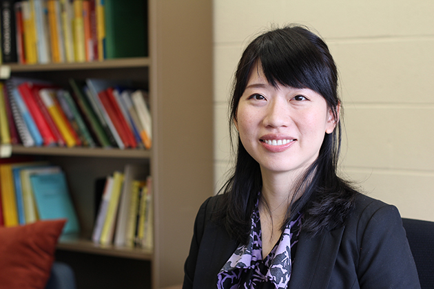 Lan-Hsuan Huang, assistant professor of mathematics, uses complex math at the intersection of geometry and calculus to understand the shape of the universe. (Christine Buckley/UConn Photo)