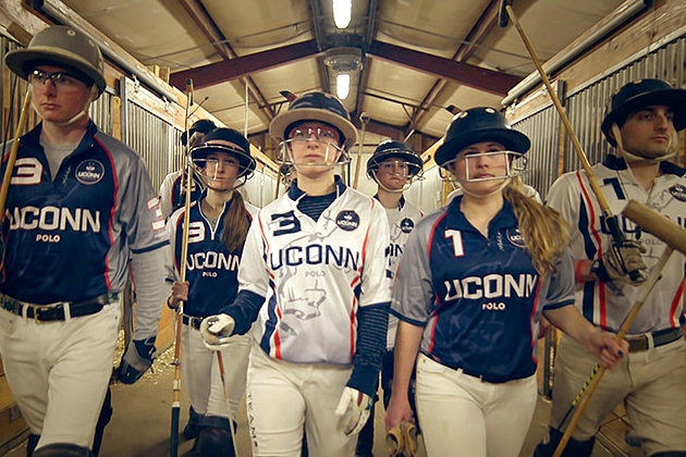 UConn polo players prepare for practice. (Angelina Reyes/UConn Photo)