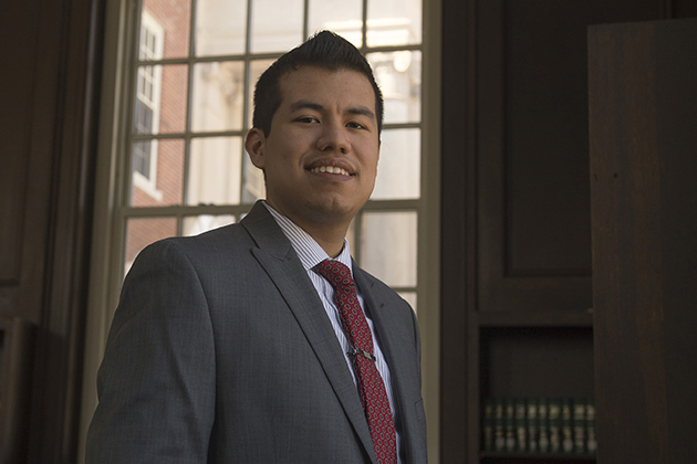 Gabriel Bachinelo '16 (BUS) at the Wilbur Cross south reading room on April 2, 2015. (Peter Morenus/UConn Photo)