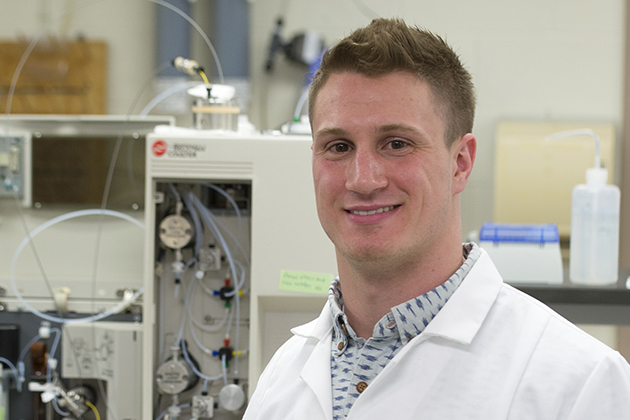 JJ Bivona '16 (CLAS) in the lab on April 16, 2015. (Peter Morenus/UConn Photo)