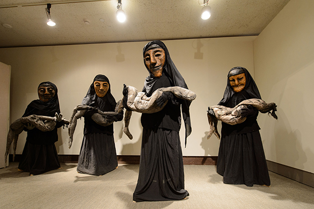 'Iraqi Women with Corpses,' part of the Bread and Puppet Theater exhibit at the Benton Museum on May 22, 2015. (Peter Morenus/UConn Photo)