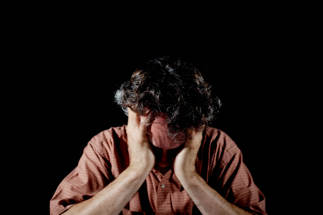 A photo illustration of a stressed person on July 23, 2015. (Peter Morenus/UConn Photo)