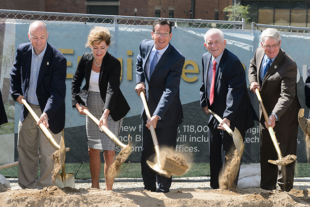 Rep. Gregg Haddad, President Susan Herbst, Governor Dannel Malloy, Chairman Larry McHugh and Rep, Tim Ackert and other dignitaries break ground for the Engineering & Science Building on Sept. 9, 2015. (Peter Morenus/UConn Photo)