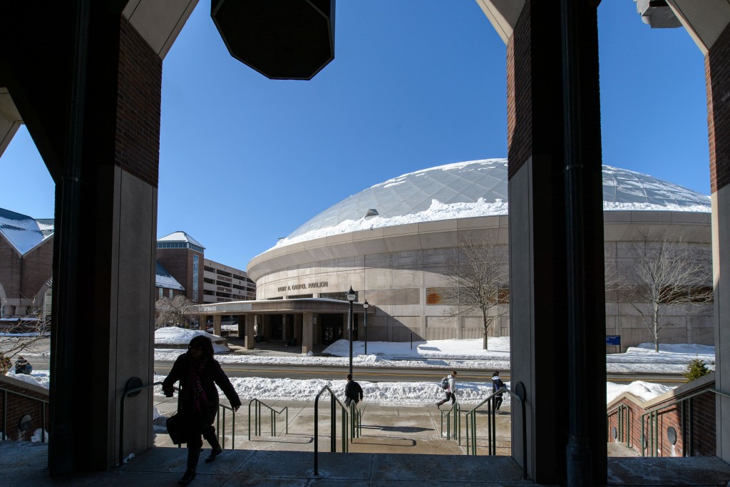 The snow is rapidly disappearing from Gampel Pavilion and the steps of the School of Business. (Peter Morenus/UConn Photo)