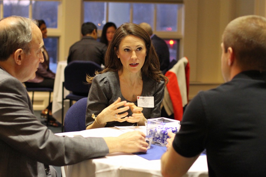 Meghan Forgione speaks to fellow networking night attendees