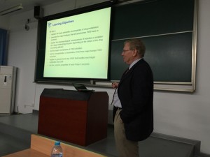 Photo of UConn School of Pharmacy Dean James Halpert giving a lecture.