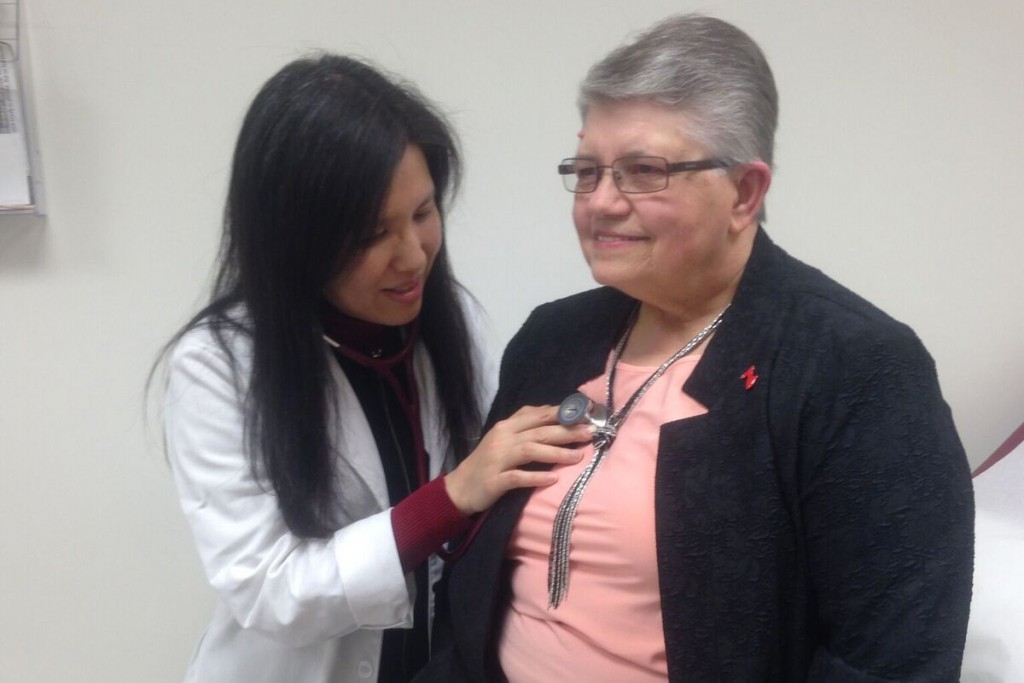 Cardiologist Dr. Joyce Meng, left, with heart attack survivor Cris Muscara. (Lauren Woods/UConn Health Photo)