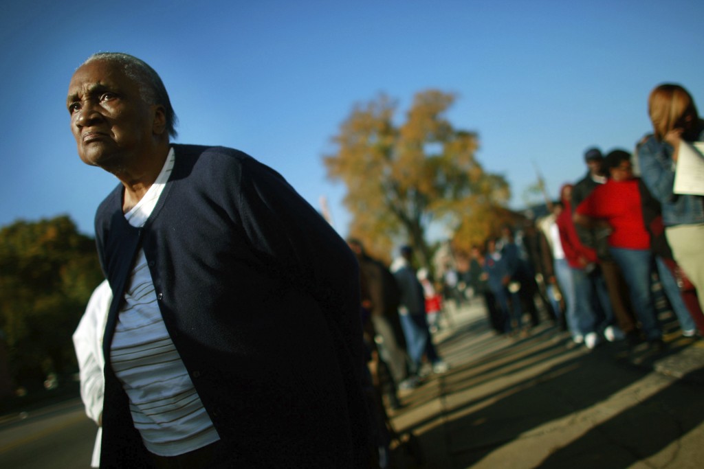 An African-American woman stands in line to vote. (iStock Photo)